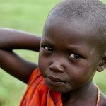 A masai boy poses for the camera in Tanzania. Photo by Perte Bracey