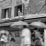 Watching the rain on the street in Venice, Italy. Photo by Pete Bracey